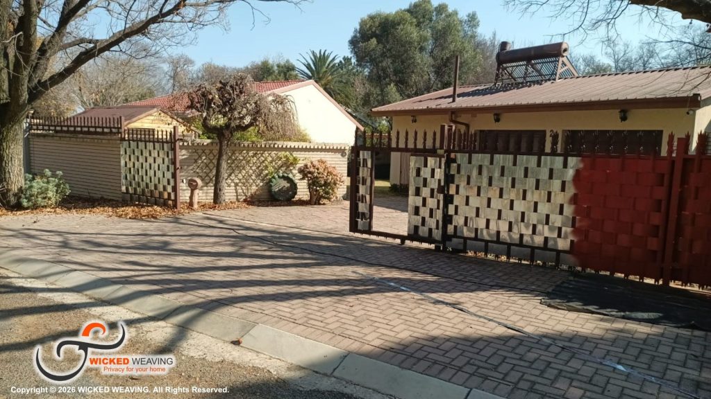 30m Terracotta Palisade Weaving Installation in Sasolburg
