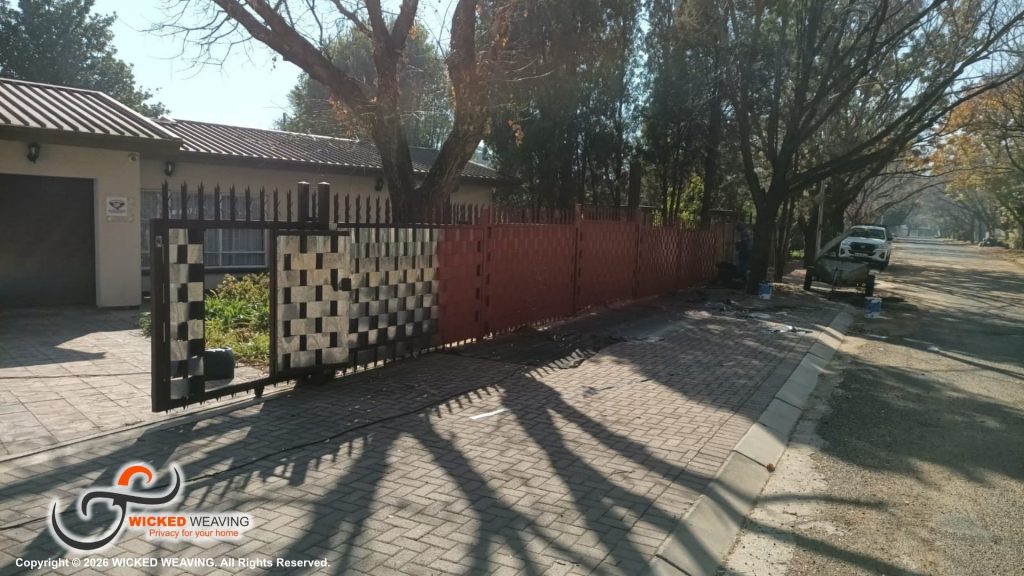 30m Terracotta Palisade Weaving Installation in Sasolburg