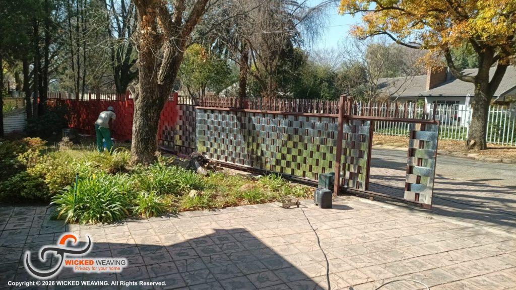 30m Terracotta Palisade Weaving Installation in Sasolburg