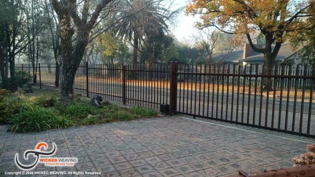 30m Terracotta Palisade Weaving Installation in Sasolburg