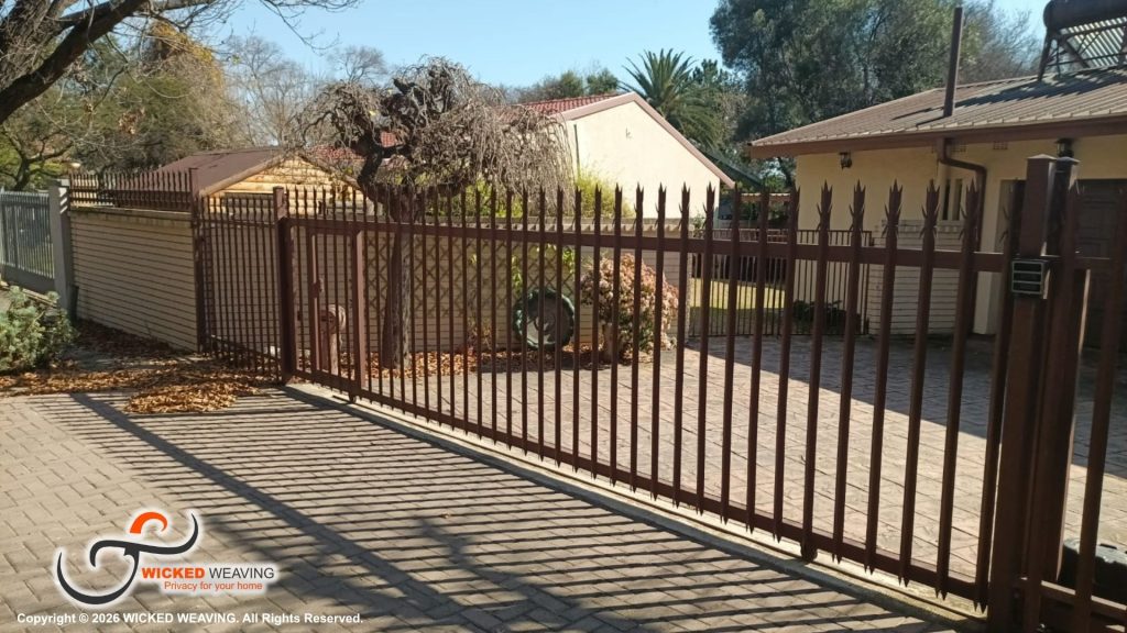 30m Terracotta Palisade Weaving Installation in Sasolburg