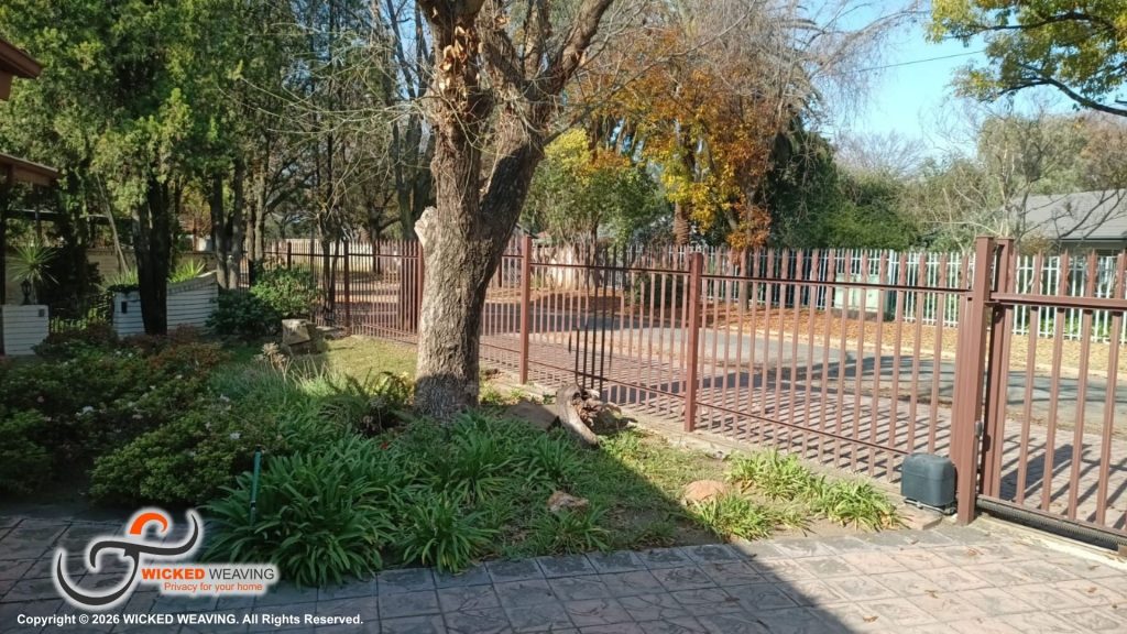 30m Terracotta Palisade Weaving Installation in Sasolburg