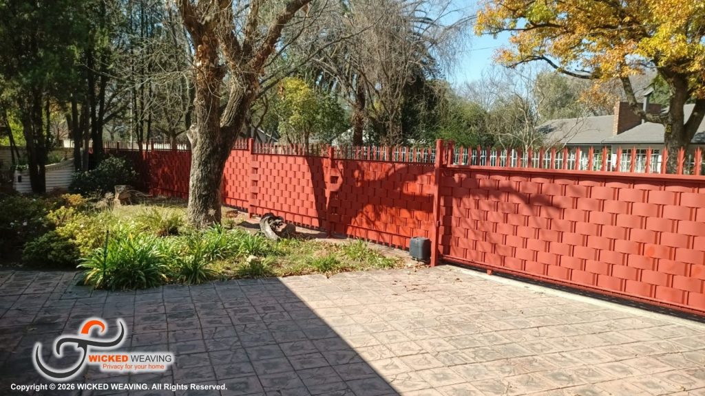 30m Terracotta Palisade Weaving Installation in Sasolburg