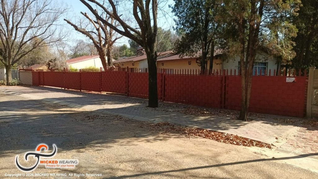 30m Terracotta Palisade Weaving Installation in Sasolburg