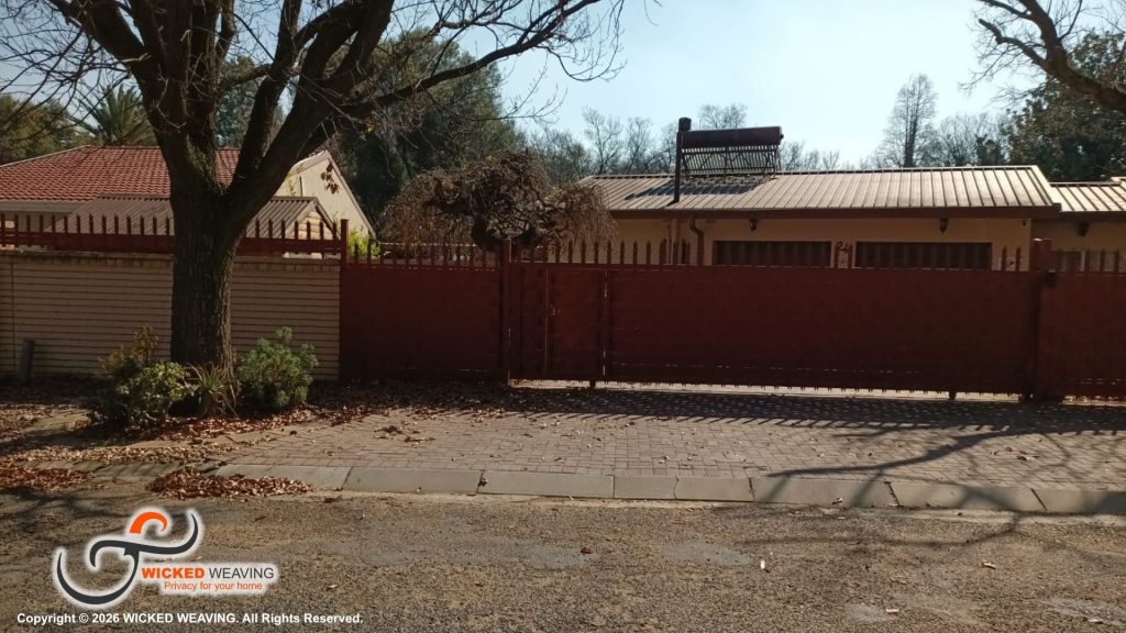 30m Terracotta Palisade Weaving Installation in Sasolburg