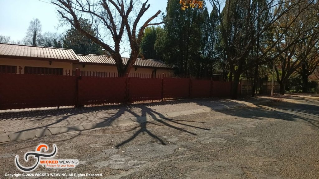30m Terracotta Palisade Weaving Installation in Sasolburg