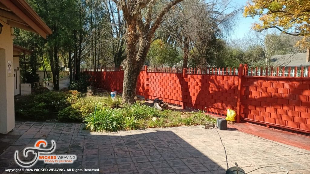30m Terracotta Palisade Weaving Installation in Sasolburg