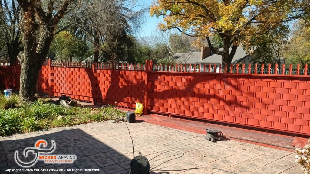 30m Terracotta Palisade Weaving Installation in Sasolburg