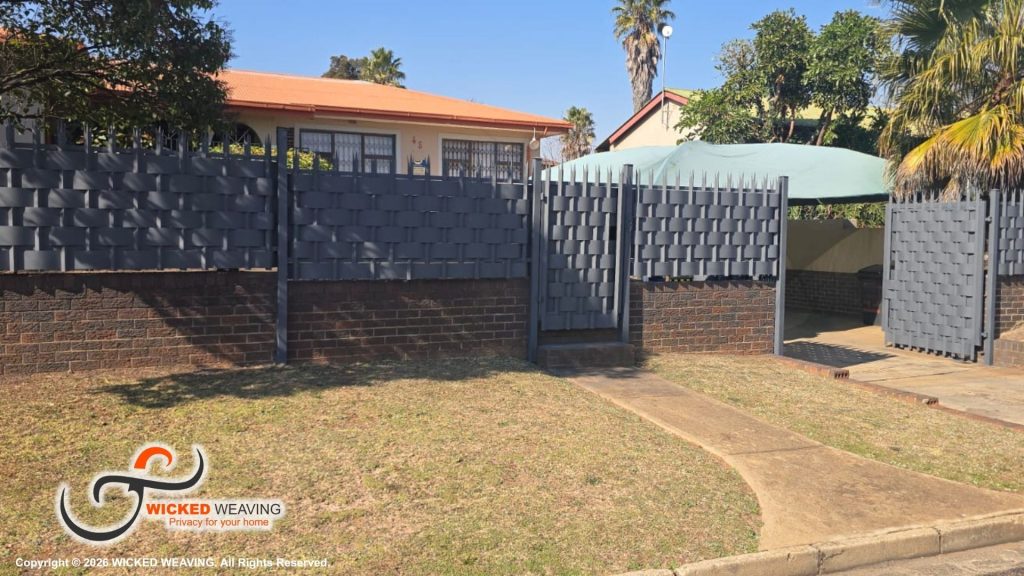 25m Slate Grey Palisade Weaving Installation in Quellerie Park, Krugersdorp