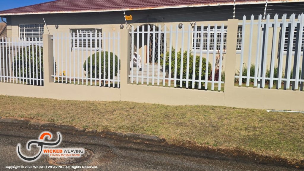 25m Charcoal Palisade Weaving Installation Completed in Sydenham, Johannesburg